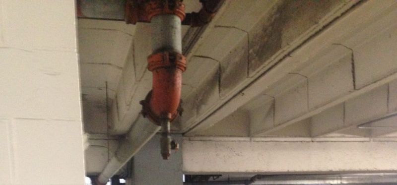Pipe in parking ramp that caused personal injury